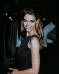  Denise Richards 10 (10x8)   Slight lifting on this gold Signature.