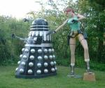  Lara Croft Statue   This is a very rare statue made by Oxmox Studios, pictured here with a Dalek (not for sale). Offers?