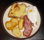 Buck Rarebit with bacon and roast potatoes.